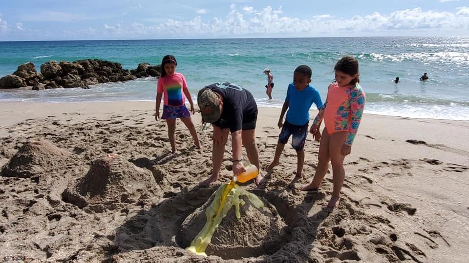 Sand volcanoes at the beach!