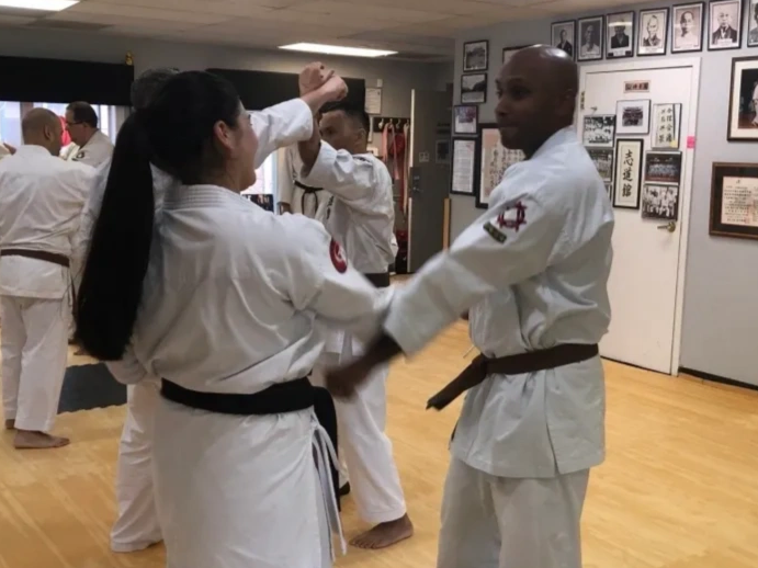 Daniel and Maria practicing six punches drill. 