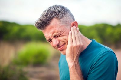 Man in distress because of Tinnitus