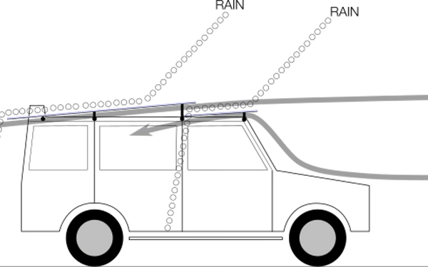 Side view of a black car with basic gray wheels.