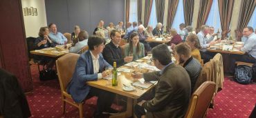 Business meeting over dinner in a restaurant.