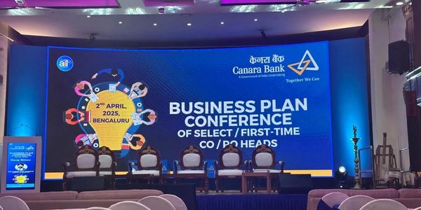 Stage setup for Canara Bank's business plan conference in Bengaluru.