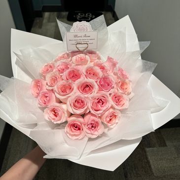 Pink-themed flowers are often associated with tenderness, love, and elegance