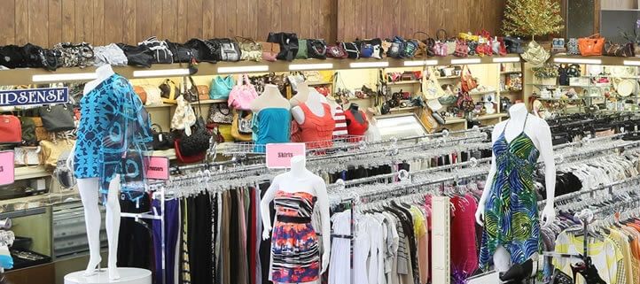 Clothing store with mannequins and accessories.