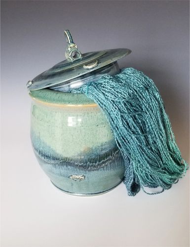 Ocean colors of blues and soft greens blend with the silkiness of this luscious yarn 