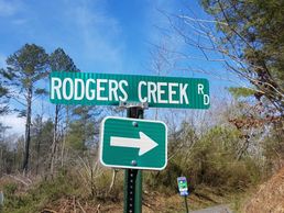 Road sign Rodgers Creek Rd.- Keep Gilmer Beautiful