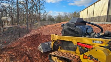 Backfill dirt around a retaining wall in Oklahoma City, Oklahoma.