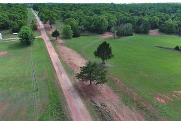 After picture of a fence line clearing in Luther, Oklahoma.