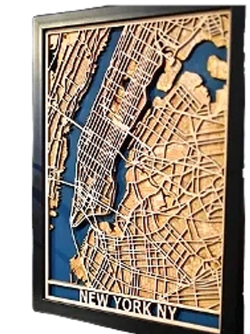 Wooden carved map of New York City with detailed streets and waterways.