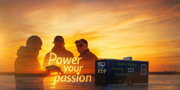 Three men at sunset with a fishing theme and business trailer.