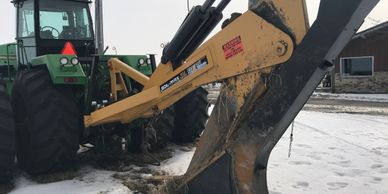 john deere tractor with tile plow