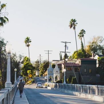 Picture of a person walking across a bridge in Los Feliz