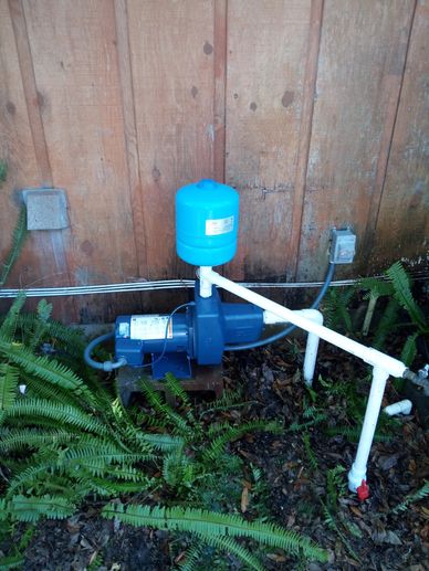 Well Pump and Tank in Garden