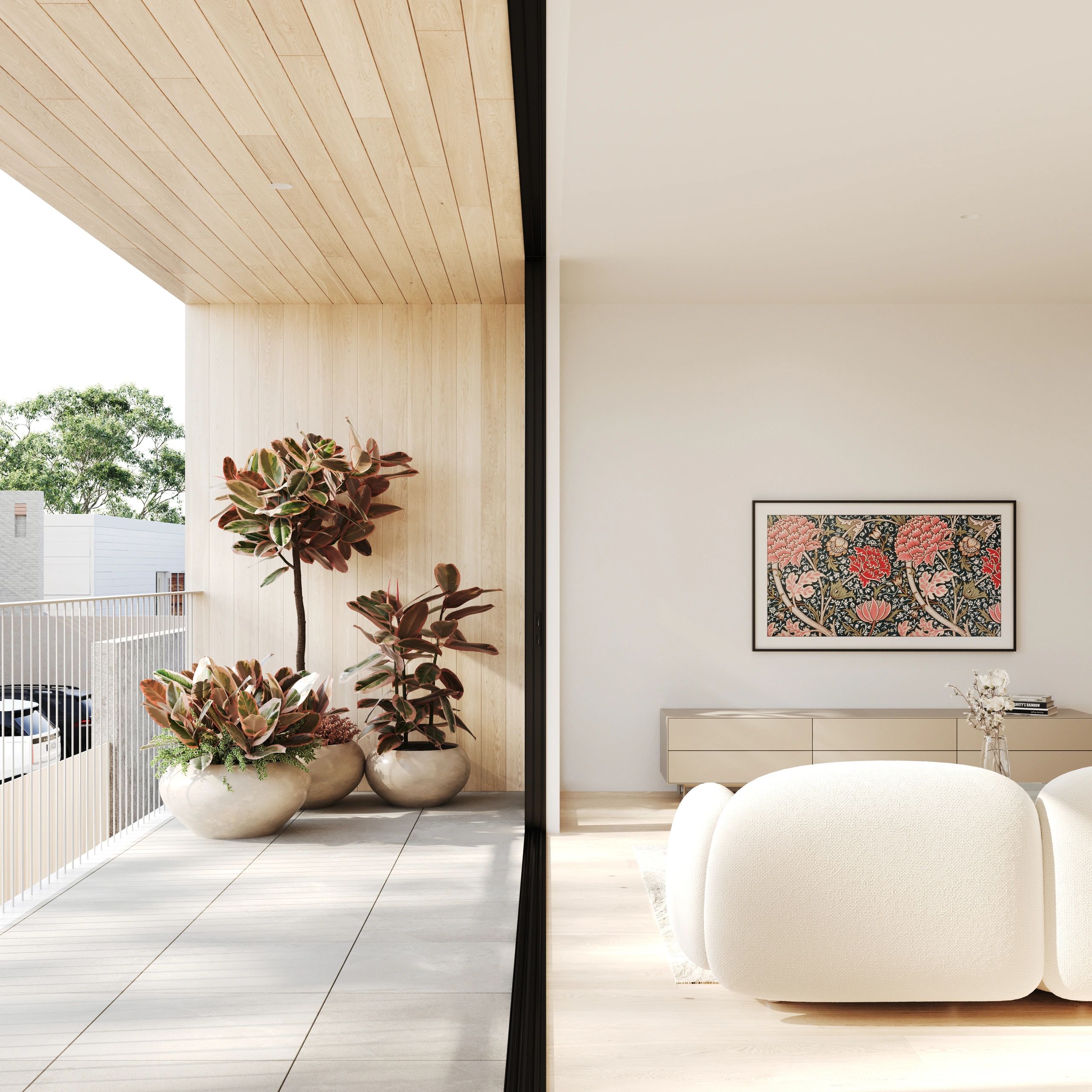 Modern balcony with potted plants and a cozy living room interior.
