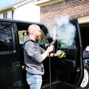 Carl steam cleaning interior wash windows in Fishers, IN.