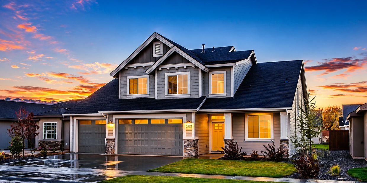 Modern house with new grey shingle roof