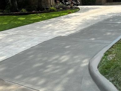 Concrete driveway extension poured in Montgomery, TX by LIT Home Services