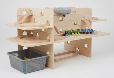 Wooden toy train set with tracks and accessories.