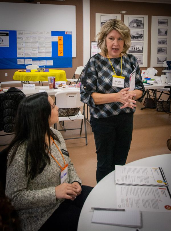 Angie, with ASA Facilitation explains concept to a training participant