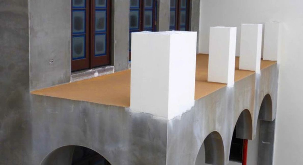 CONCRETE BALCONY WATERPROOFED WITH SAND TO REFUSAL