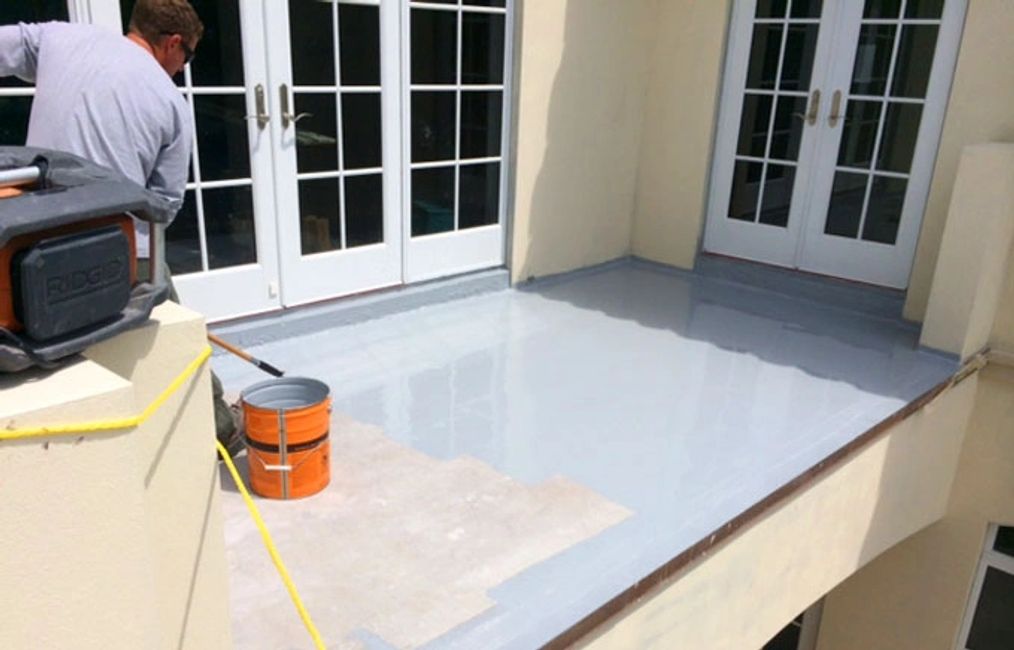 BASE COAT WATERPROOFING AT CONCRETE BALCONY