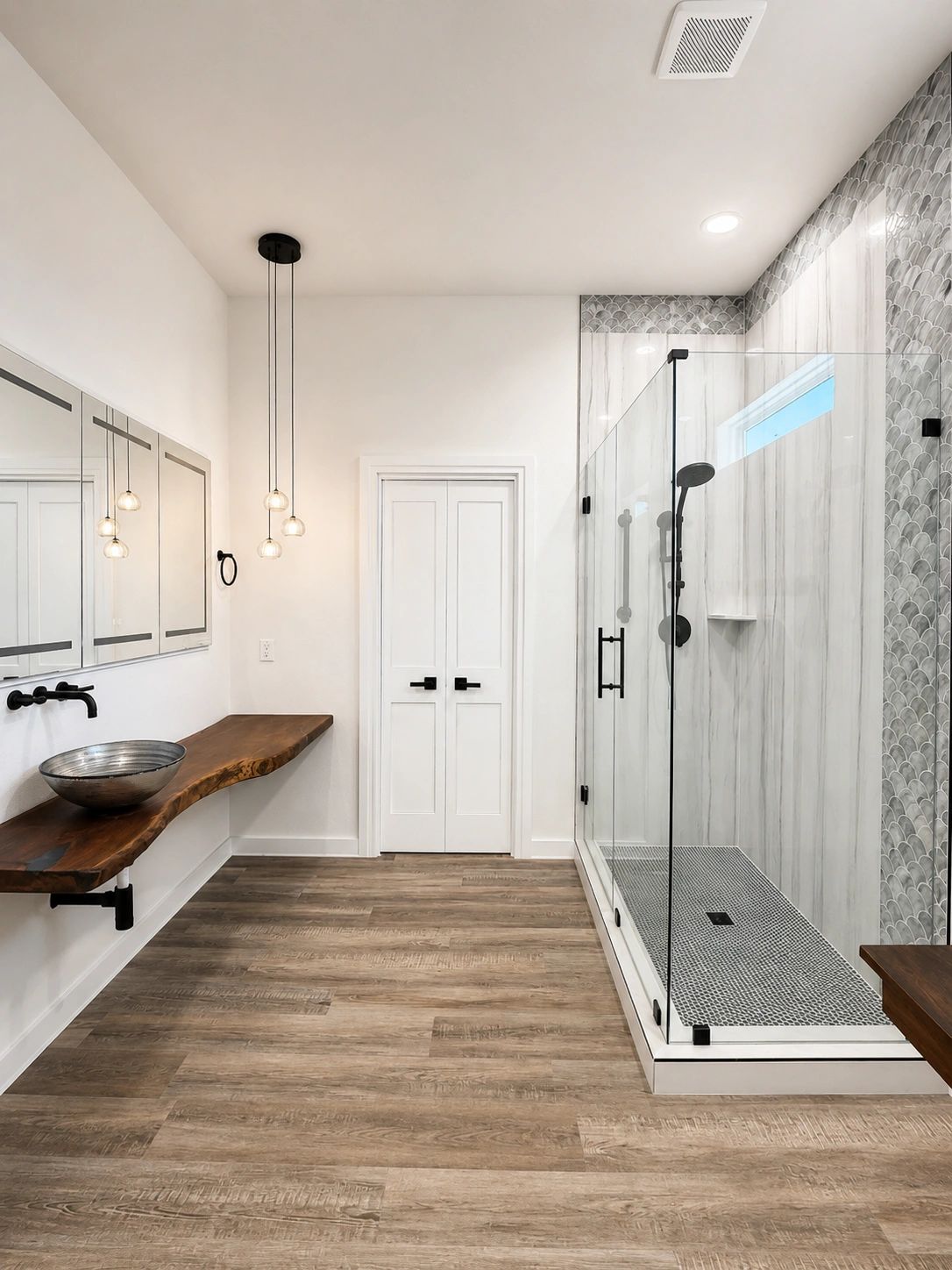 A bathroom remodeled by WM Construction Services on a lakefront home in Walden on Lake Conroe.