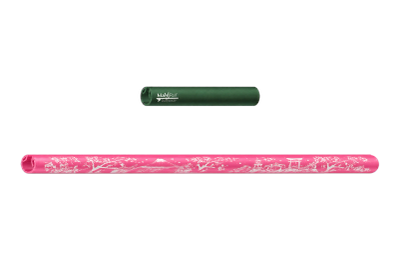 Two rolled paper items, one green and one pink with white designs.