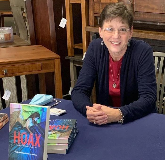 Image of Leanna Sain at her book launch of Hoax.