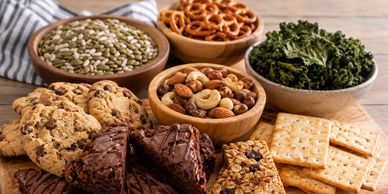 cookies, brownies, granola bars, crackers, nuts, kale chips, pretzels, pumpkin and sunflower seeds