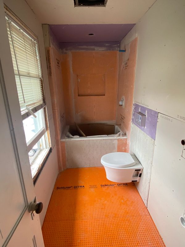 ABBA construction group Schulter Kerdi waterproof membrane in tub Ditra  Membrane on the floor 