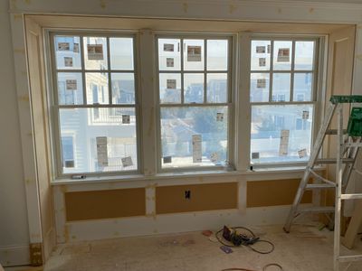 abba construction group new millwork trim installed around Andersen triple 400 series windows