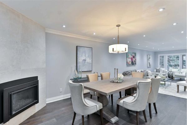 open concept dining are with fire place, lime stone hearth and new millwork stone harbor nj 