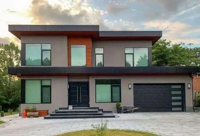 ABBA CONSTRUCTION GROUP ACM PANEL INSTALLED ON NEW CONSTRUCTION HOUSE.  ALUMINUM COMPOSITE PANELS. 