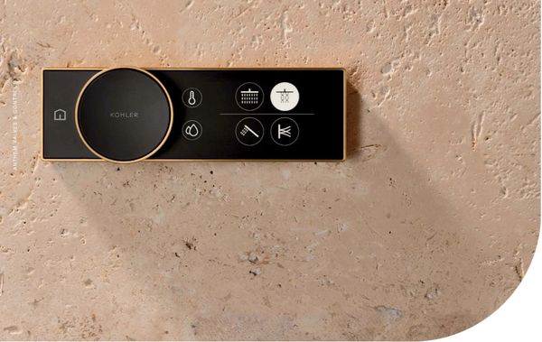 ABBA Construction Group Kohler statement shower selector panel in black with rose gold accents 