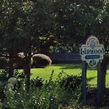 ABBA CONSTRUCTION group photo of Linwood city road sign