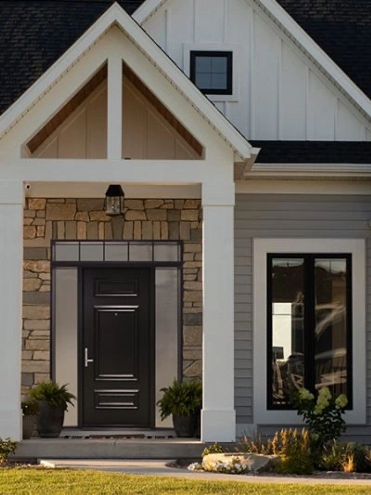 abba construction group Portatec Exterior Solid Black Door with double sidelights &  transom windows 