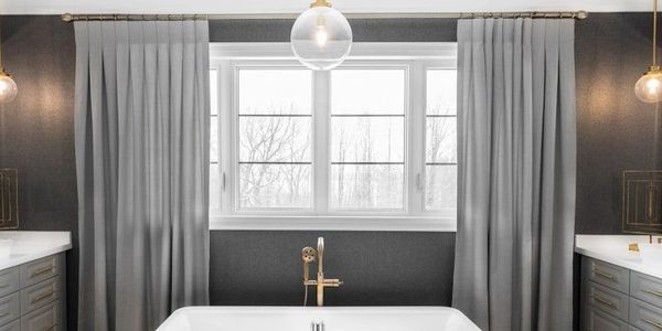 master bathroom of freestanding tub and two vanities flanking the left and right in Stone Harbor NJ 