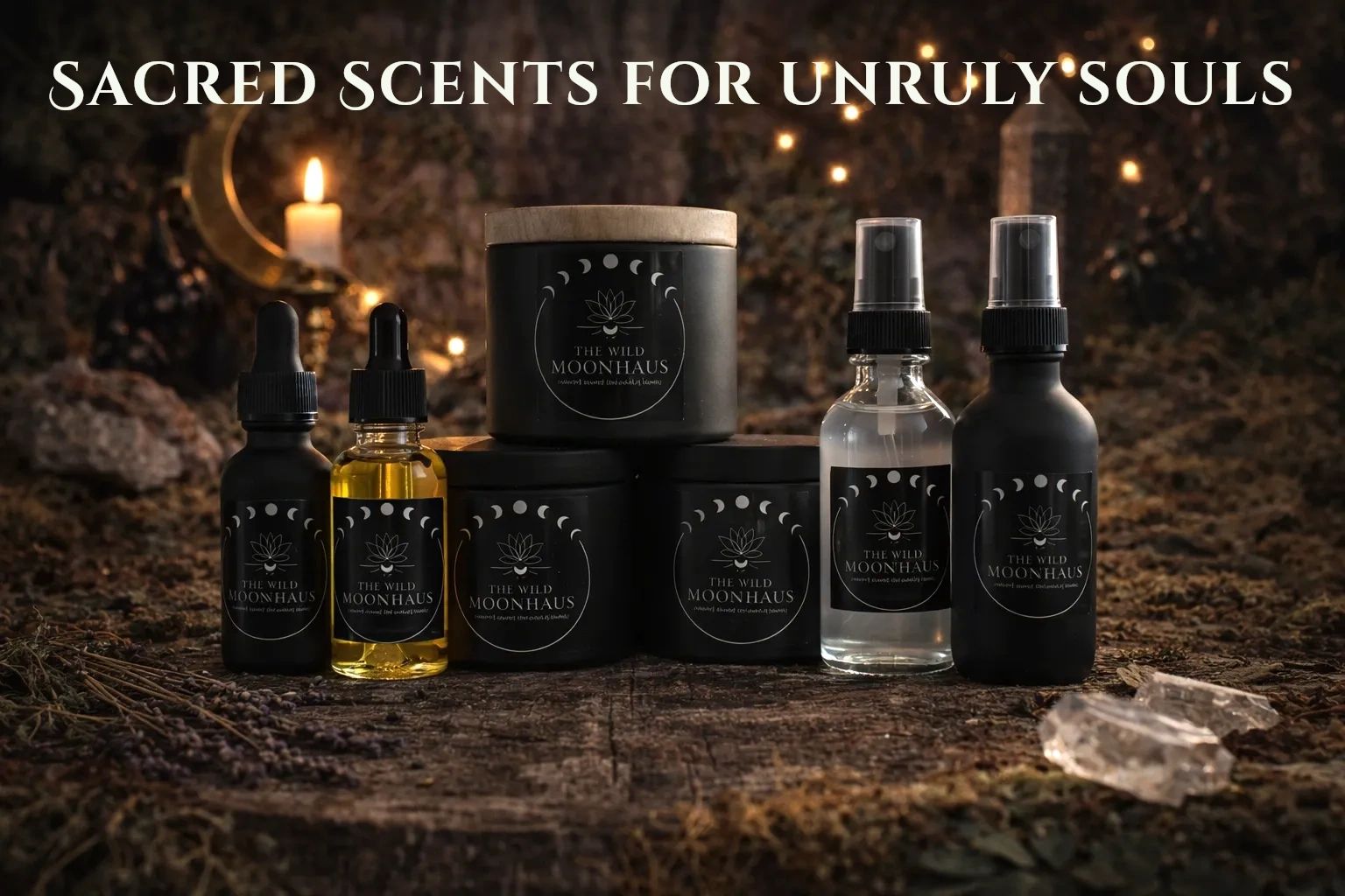 Mystical scented products from The Wild Moon Haus arranged on a rustic surface with a candle in the background.