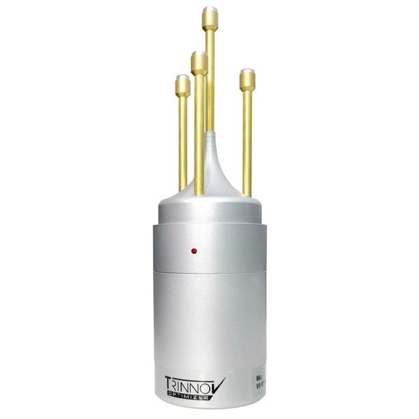Silver and gold electronic device with four tall antenna-like rods.