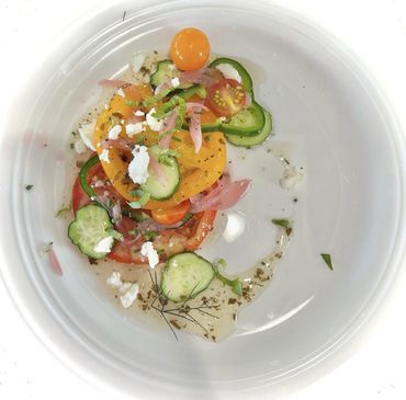 Heirloom tomato salad, pickled peppers, feta, herbs