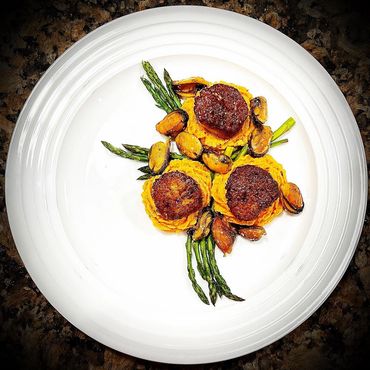 Pan seared scallops, sweet potato romesco, fried mussels