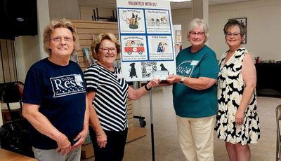 Dottie Kracke, Pat Bethany and Amanda Green receive Sister ACTS donations.