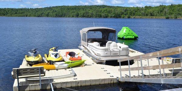 Ez dock floating dock system with a ez port, pontoon dock and two PWC lifts.