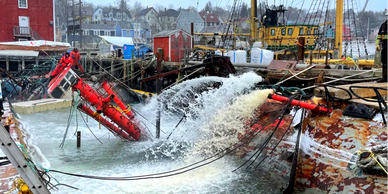 Pumping water from the sunken vessel PRIMO in Lunenburg, NS.