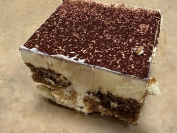 Layers of cookies, soaked in espresso coffee, with a rich sweet mascarpone cheese.
