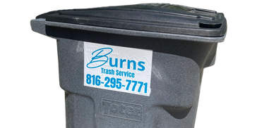 Trash can with Burns Trash Service sticker