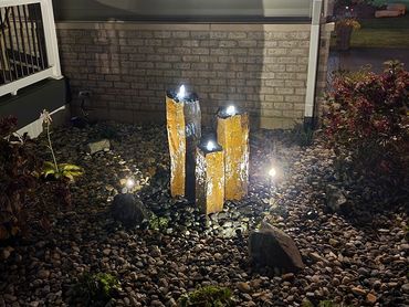 Extend your evenings and add lighting to your decorative water feature.