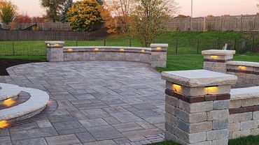 Extend your outdoor time with a paver patio and outdoor lighting.