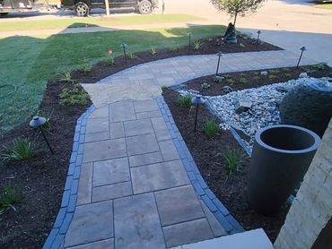 entryway paver walkway with cut in stepping stone and cut in in-lite lighting