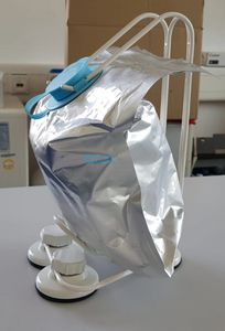 Dispensing apparatus and holder for table for dry and wet wipes